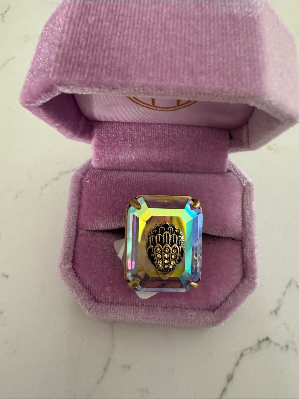 Kurt Geiger Iridescent Aurora Crystal Ring with Gold Emblem - Purple